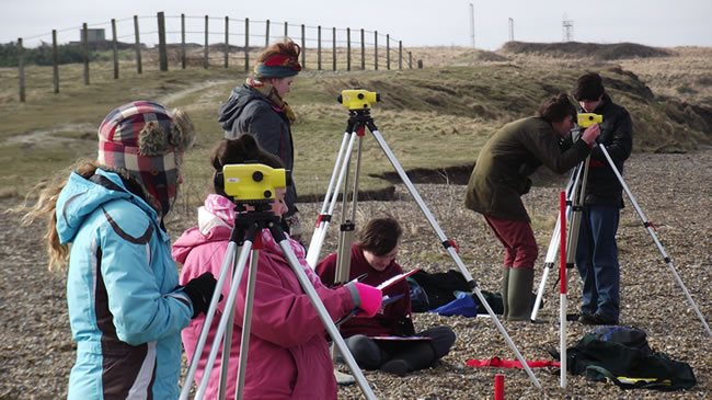 Fakenham College A Level students surveying beach profiles at Weybourne, North Norfolk.